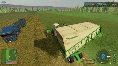 farming simulator 22 cutting grass and transporting to silo