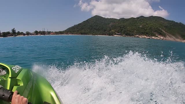 girl riding a jet ski for the first time