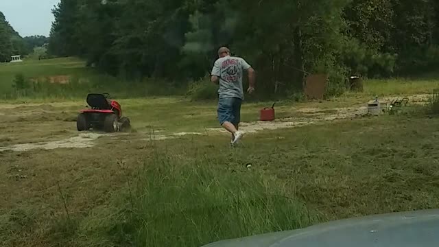 Son Plays Practical Joke On Dad Making Him Jump Off A Lawnmower