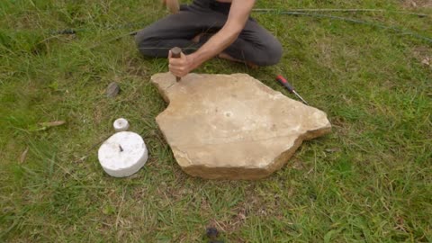 Carving a grindstone