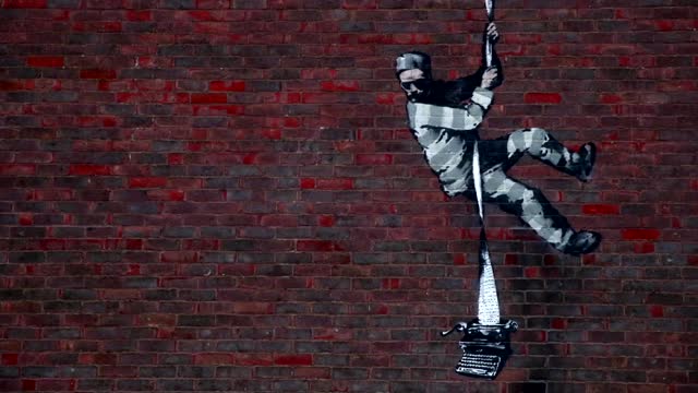 Banksy may have scaled prison wall for latest work