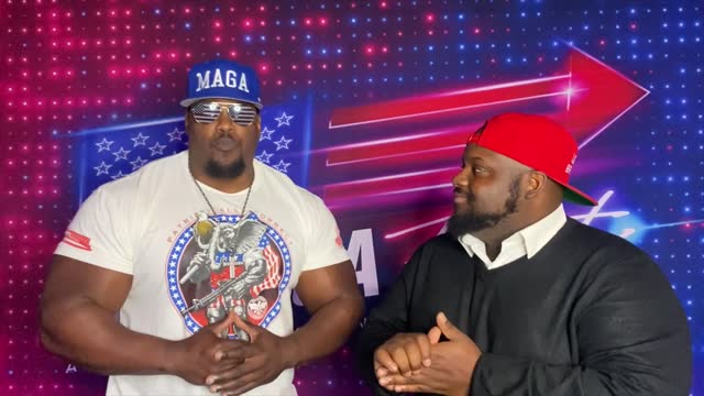 Ron J Spike speaking with Stephen Davis, A.K.A. MAGAHulk, at AmericaFest 2021