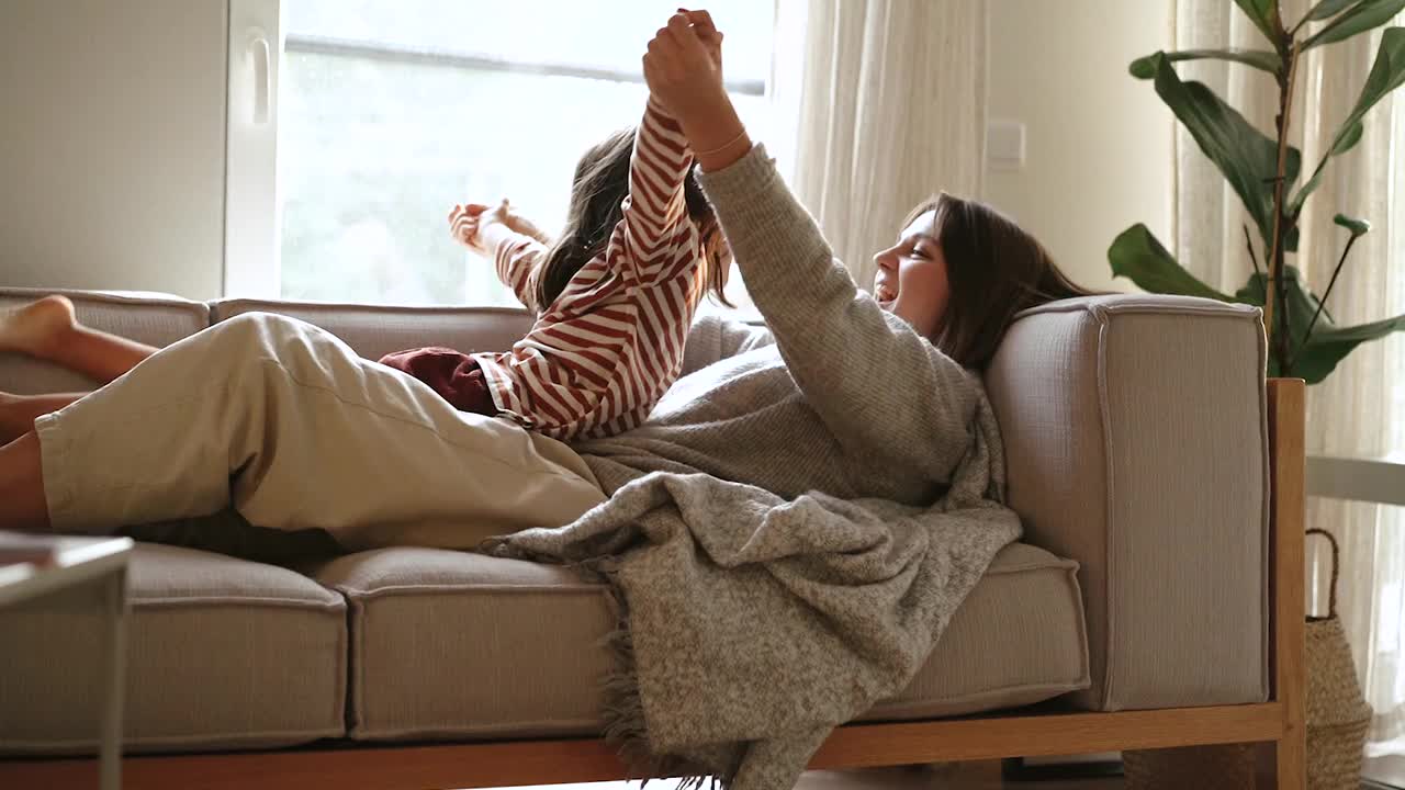 A Mom Playing With Her Daughter