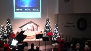 Mrs. Sarah singing "O Holy Night"