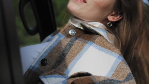 beautiful girl at car window enjoy