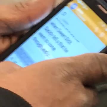 Guy texts in big font on cellphone screen "sweet dick daddy" on subway train