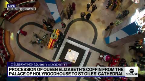 King Charles III leads the processional for the queen into St. Giles’ Cathedral