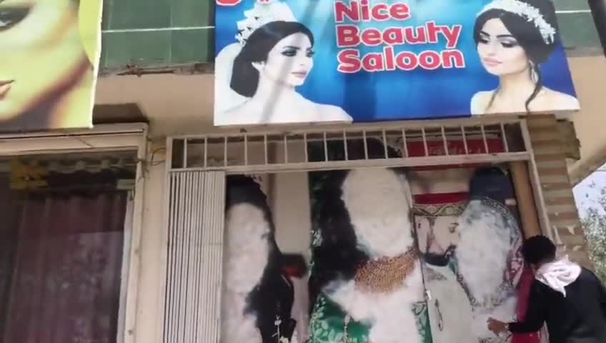 Afghanistan under Taliban Sharia Rules - Women's Uncovered Faces Removed from City Walls