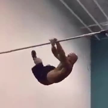 Jock on the horizontal bars
