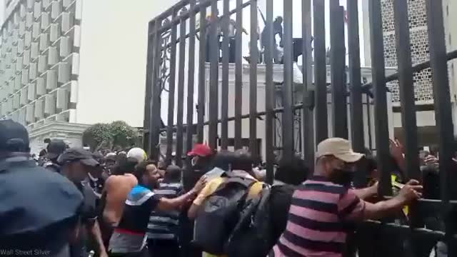 Sri Lankans broke into the gates of their Central Bank. 2