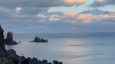 The sea of Jeju Island at sunset