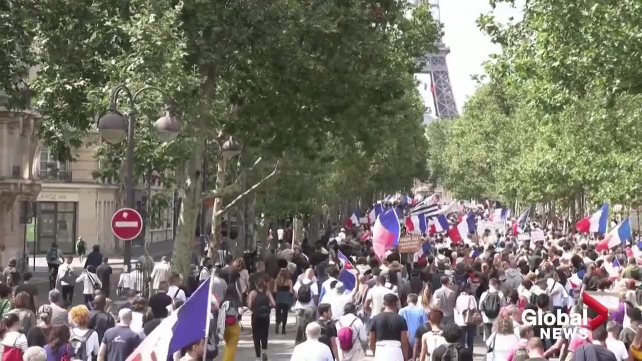 Thousands stage Paris protest against Macron's health pass