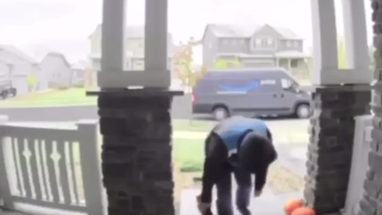 Amazon delivery driver takes a real nasty spill not once but twice!