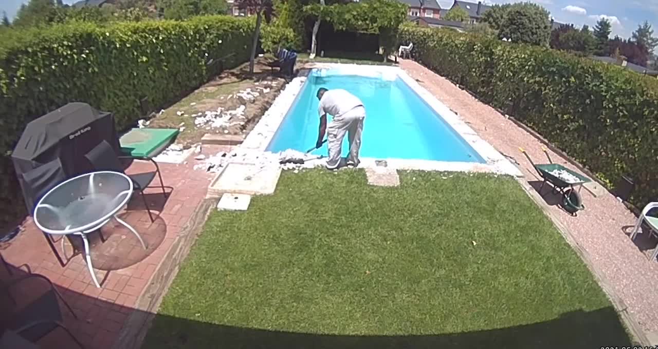 Man Cleaning Around Pool Slips and Falls Inside