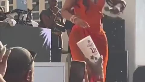 Cardi b throw a microphone at an audience member who throw a drink at her while she was performing