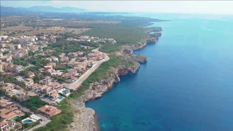 aerial landscape of the beautiful bay of cala mandia with a wonderful turquoise sea porto cristo