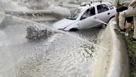 Woman Drives Her Car Into a Fountain