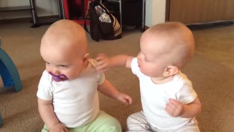 Twin baby girls fight