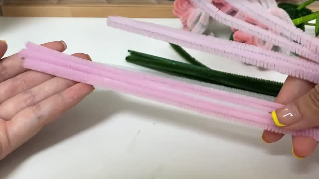 The first step is to make a twist stick gradient rose by hand.