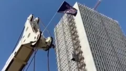 Wagner flag being hoisted in Tel Aviv.