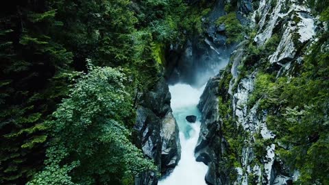 Aerial Drone Video of A Waterfall With Rocks And Raging Water