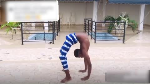Guy Shows Impressive Flexible Skills With His Friend's Help By Performing Various Tricks