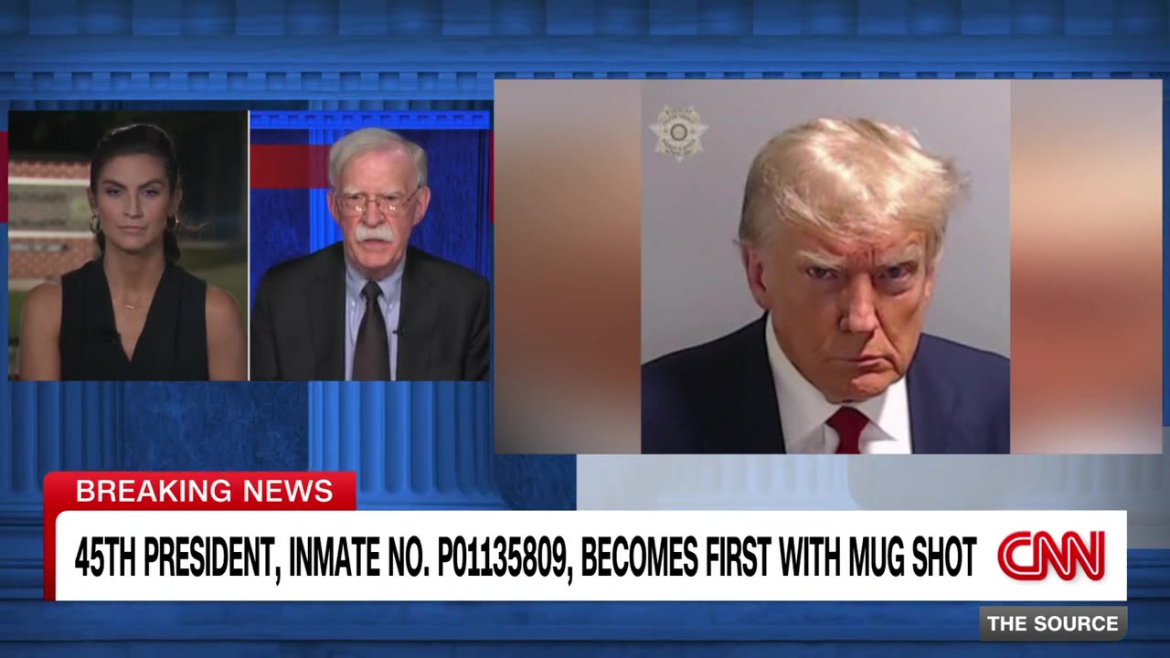 Bolton on Trump booking photo: 'He looks like a thug'