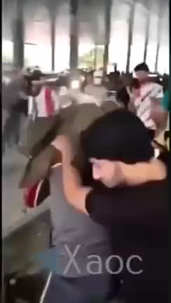 Protester starts screaming & spewing smoke from his eyes, mouth, nose and ears