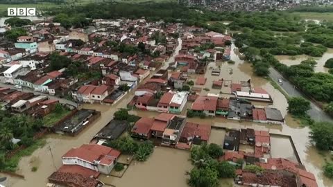 Dams burst in Brazil as deadly flooding continues - BBC News