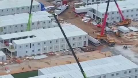 A new quarantine camp is being built in China's Guangzhou city and designed to detain 87,000 people.