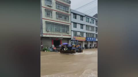 Bulldozer used to save villagers by local politician during floods