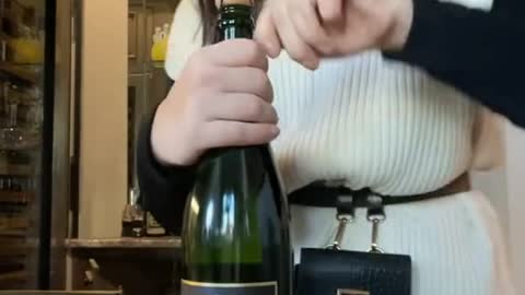 Champaigne Bottle Unexpectedly Ejects Cork