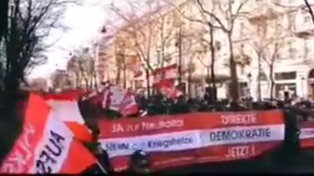 Creative protest from Vienna as they labor to carry the load of fascism on their shoulders