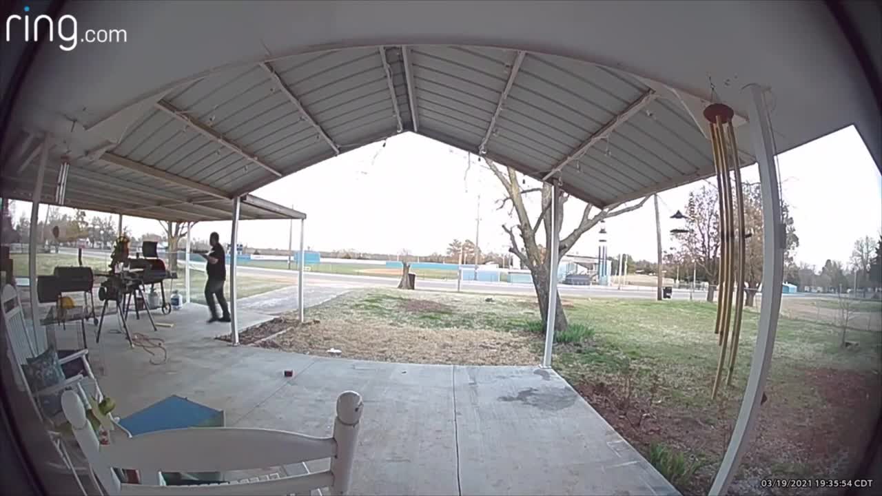 Man Holding a Plate Tried to Turn on an Outdoor Grill but He Almost Caught on Fire