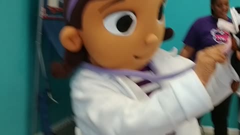 Fix the stuffed dog game with doc McStuffins at birthday party in Munchkins academy in Richmond Tx