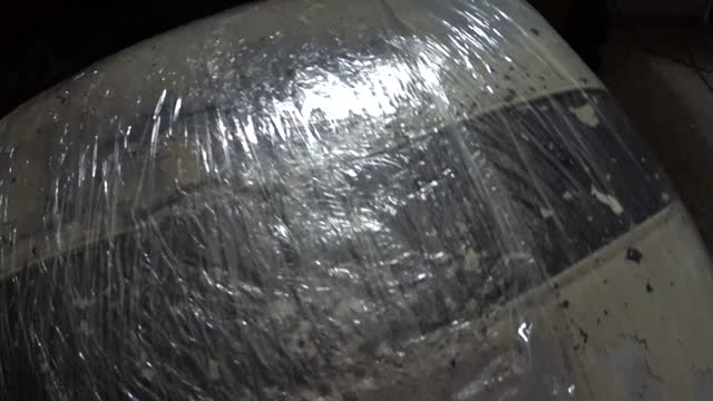 SO I JUST WRAPPED MY CHAIR UP IN PLASTIC,.....