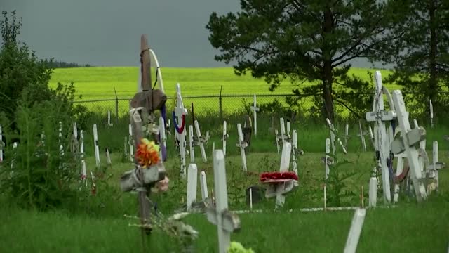 Pope prays at cemetery for indigenous people in Canada