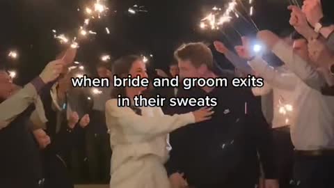 when bride and groom exits in their sweats