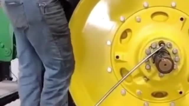 An accident when a repairman repairs a car # Repair a car