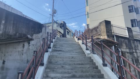 It's a Korean apartment called Gaura..and the stairs, and clouds