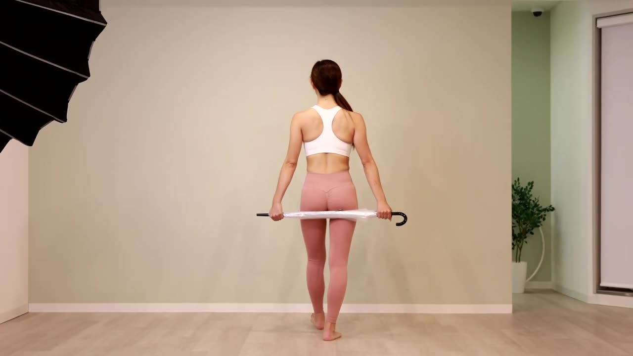 Walking practice using an umbrella