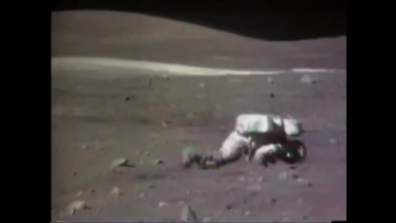 Astronauts falling on the moon