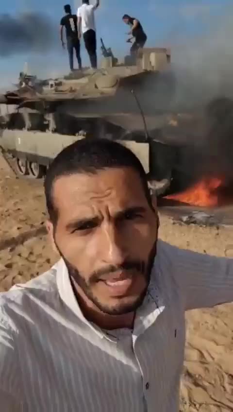 Palestinians driving IDF vehicles into the Gaza Strip Israeli soldiers being taken hostage.