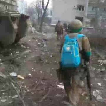 Ukrainians Walking Through Bakhmut