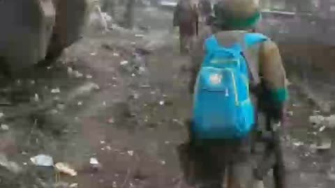 Ukrainians Walking Through Bakhmut