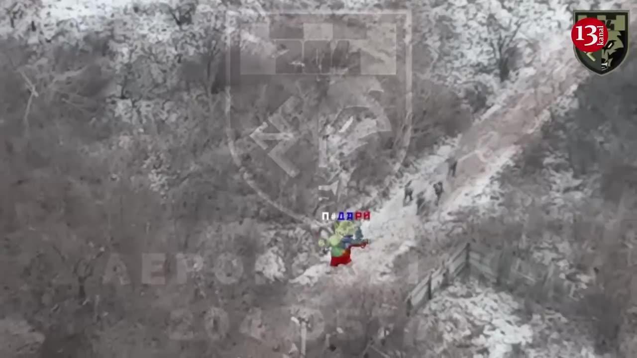 Ukrainian soldiers enter on foot and in vehicles area where Russians are located- live drone footage