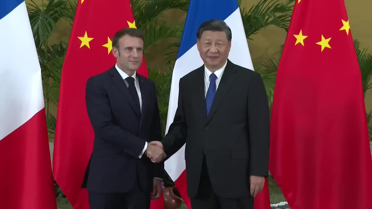 Macron, Xi shake hands as talks start in Bali