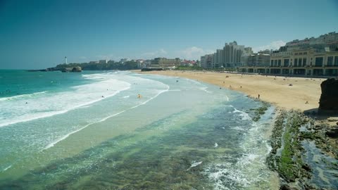 mixkit-ocean-waves-bursting-on-the-shore-of-the-coast