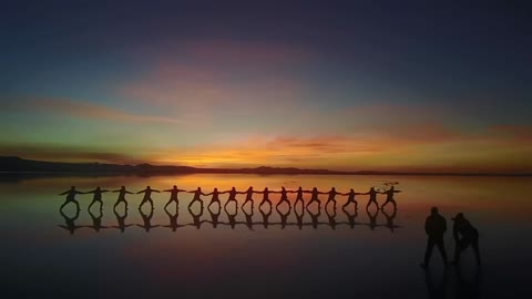 The lake at dusk looks like a mirror