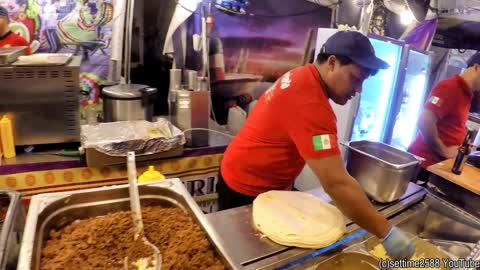 Mexico Street Food. Preparing Lots of Tacos and Burritos